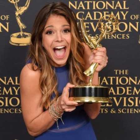 katie Nolan with Emmy 